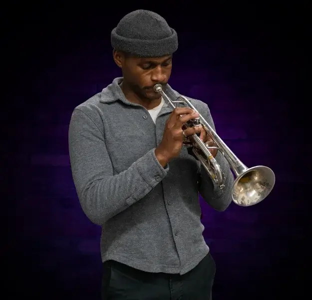 Young man playing trumpet