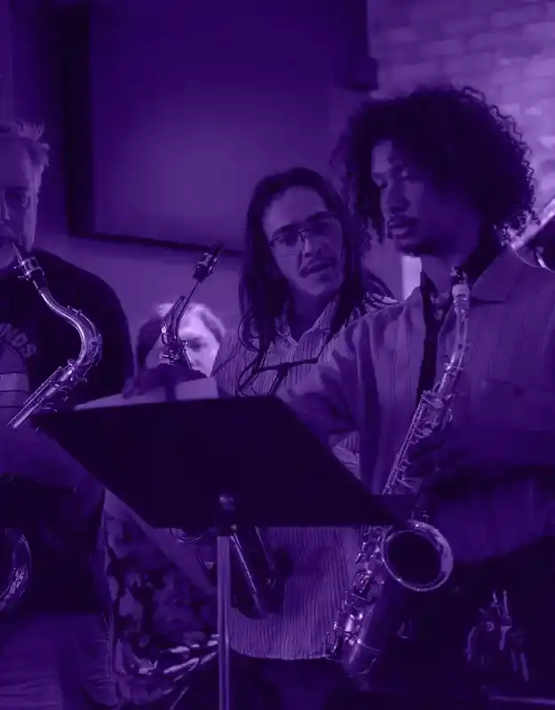 Music students and teachers learning in a group