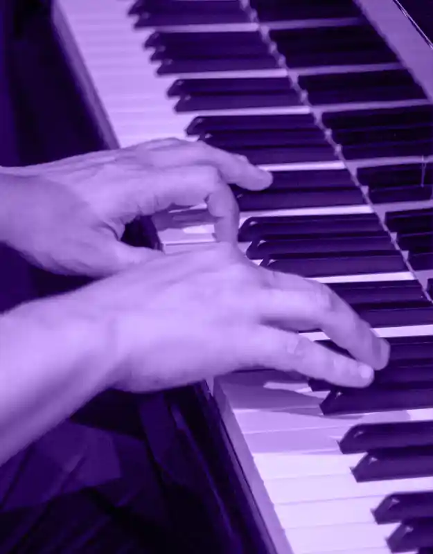 Piano teacher expertly playing a jazz standard