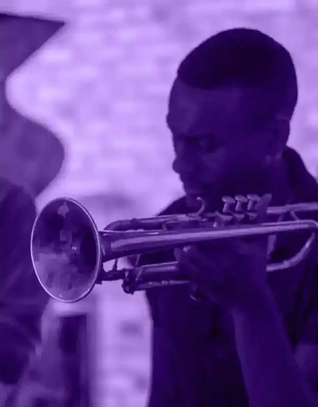 Trumpet instructor Isaac finishing a solo at jazz jam session
